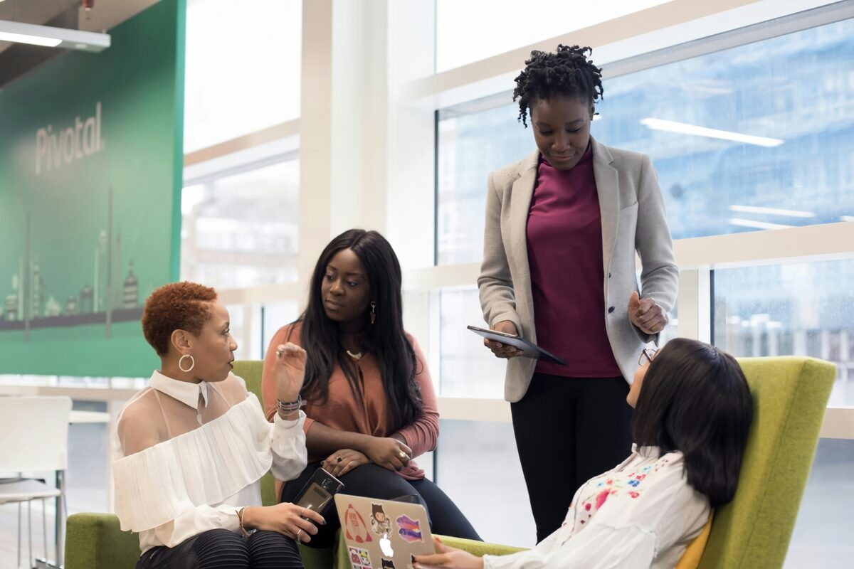Employees engaging with impact investing platform