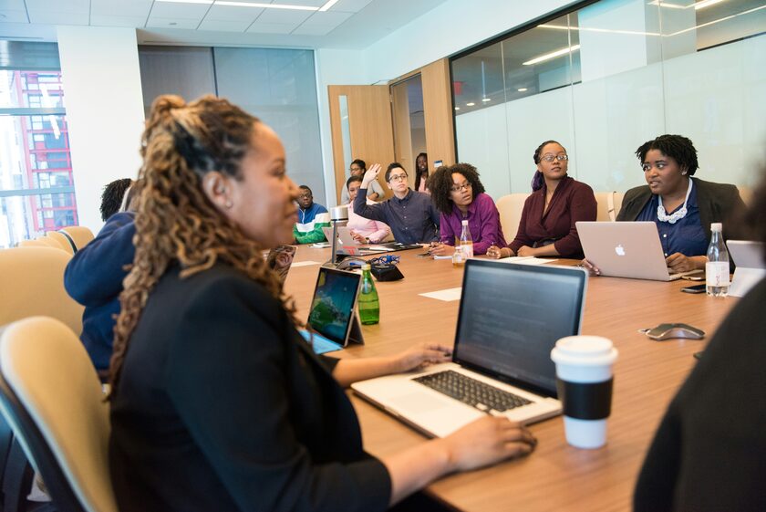 Corporate team engaged in impact investing